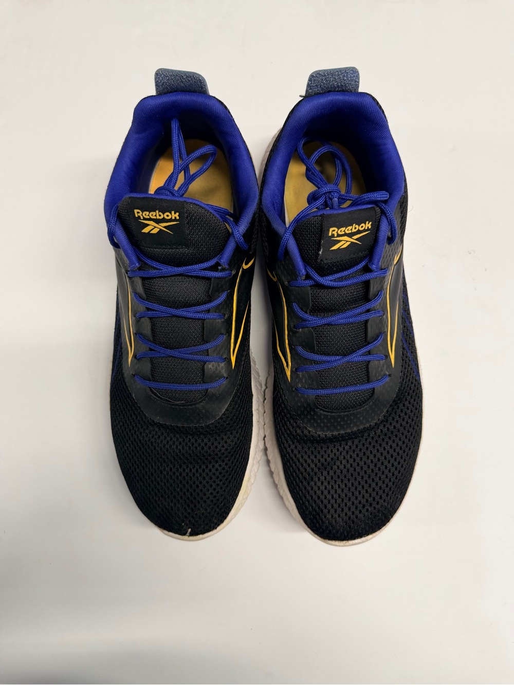 Reebok Black Sneakers with Blue Lining and Yellow Accents